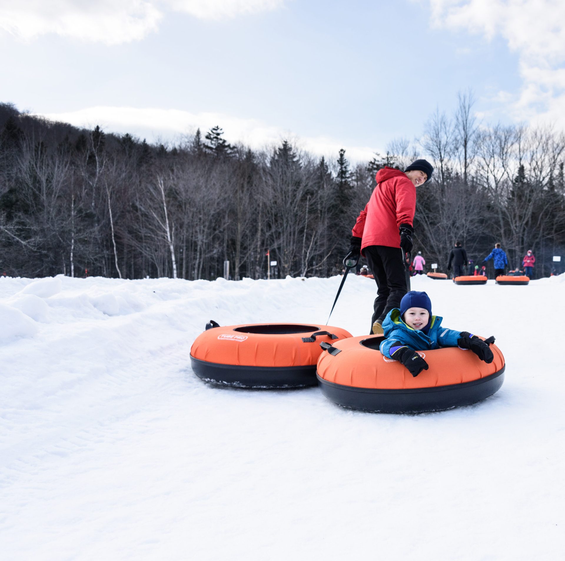 a person riding skis down a snow covered slope