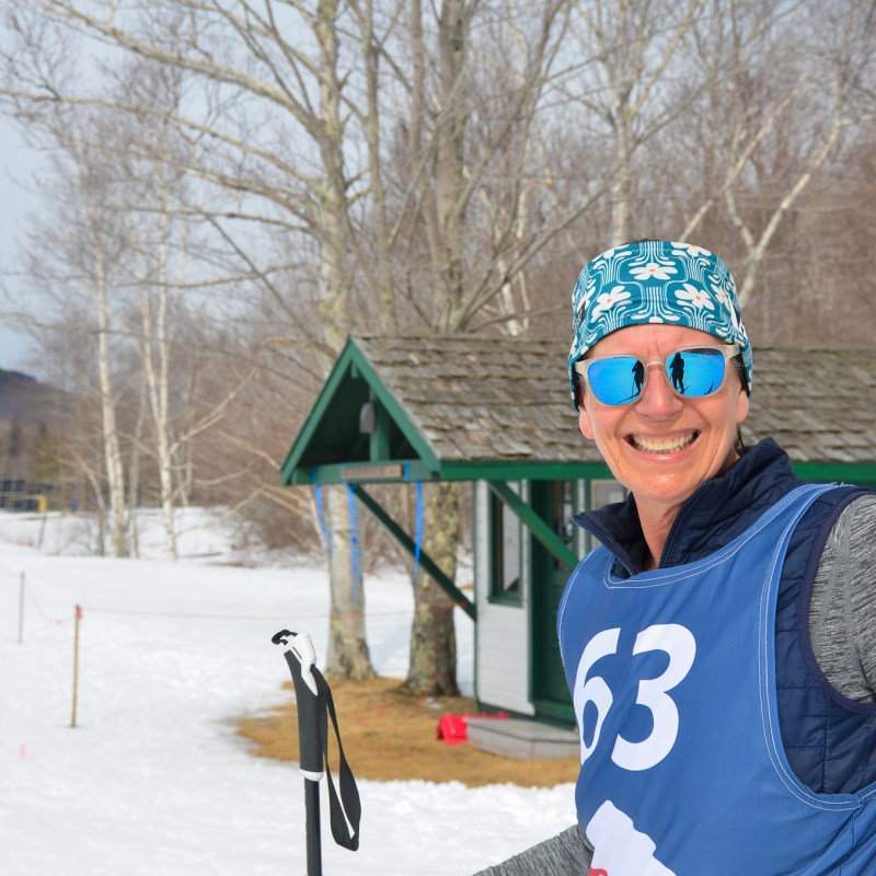 a person that is standing in the snow